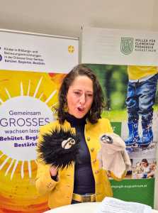 Vortragende mit Handpuppen